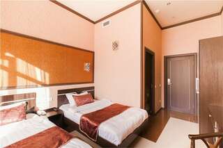 Гостиница Golden House Нижний Новгород Двухместный номер с 2 отдельными кроватями-1